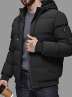 Alexander | Chaqueta de invierno acolchada de hombre con capucha, puños de canalé y cremallera