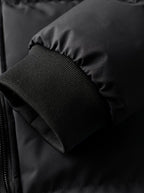 Alexander | Chaqueta de invierno acolchada de hombre con capucha, puños de canalé y cremallera
